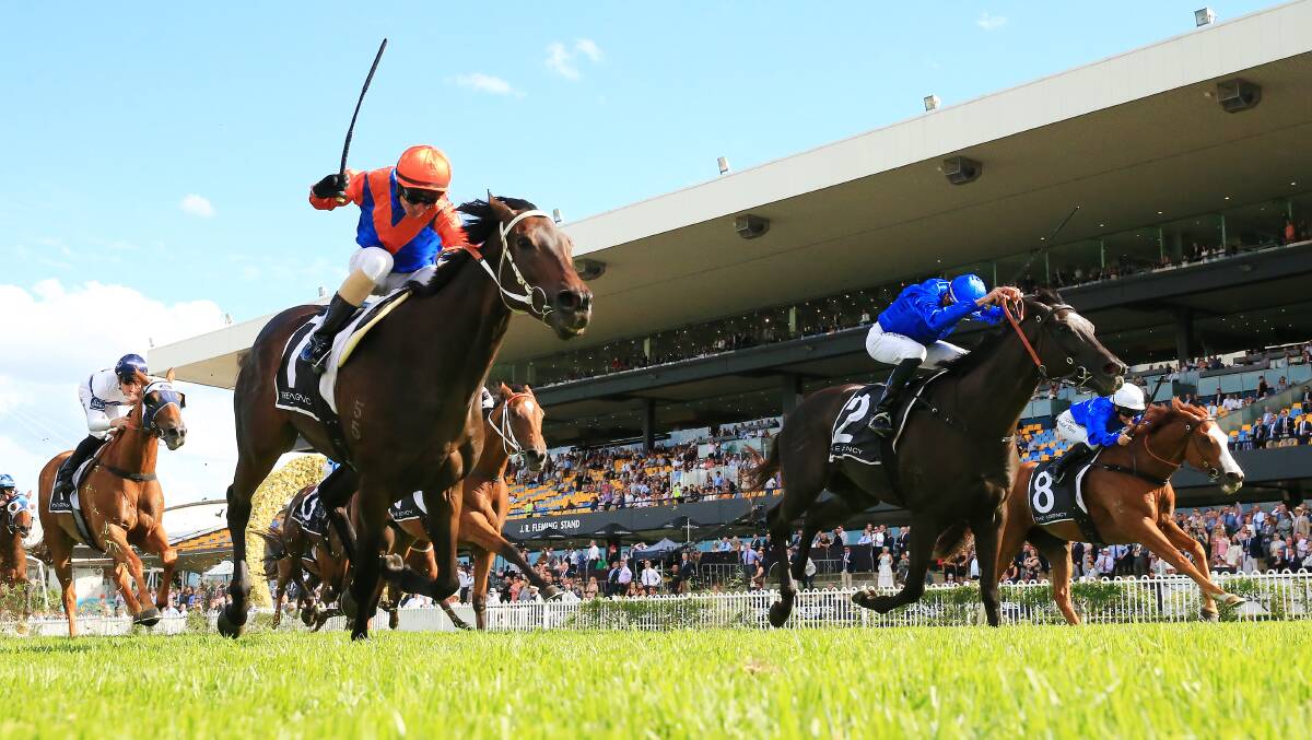 First past the post: Glen Boss gets Think It Over (left) home in Saturday's George Ryder Stakes. Picture: Mark Evans/Getty Images