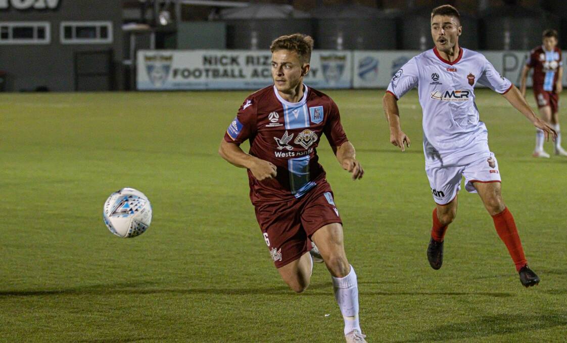 Out in front: Former Wolves player Harry Callahan during APIA Leichhardt's victory over Wollongong. Picture: Football NSW.