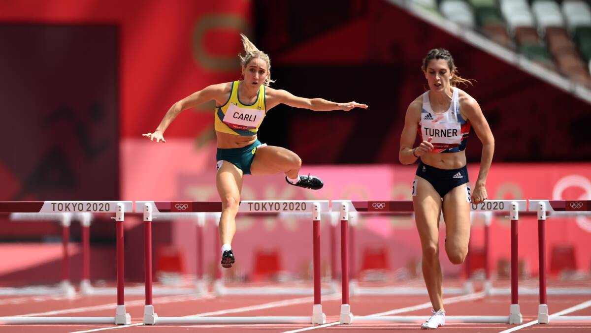 Just another hurdle: Sarah Carli races at the Tokyo Olympics on Saturday morning. Picture: Matthias Hangst/Getty Images