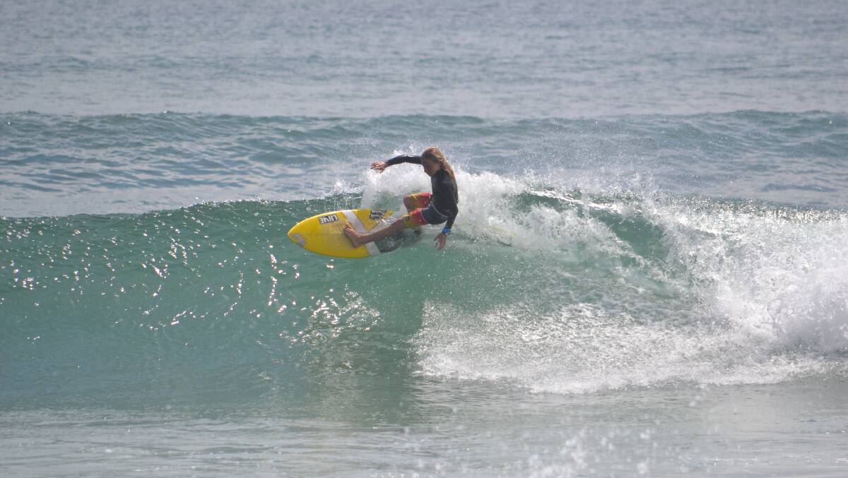 Family affair: Summer's brother Taj has also displayed his talent on the surfboard. Picture: Mark Simon.