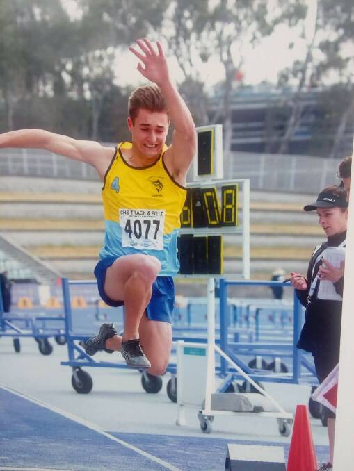 Taking flight: Dapto pentathlete Jonty Faulkner in the long jump.