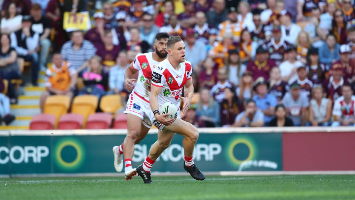 On the run: Mat Dufty returned to form in Sunday's victory over the Broncos. Picture: NRL Imagery/Jason O'Brien.
