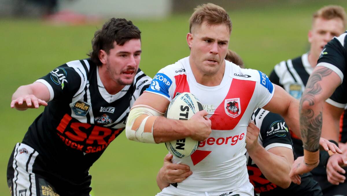 Back in action: Jack de Belin charges forward during the Dragons reserve grade clash on Saturday afternoon. Picture: Jeremy Ng/Getty Images.