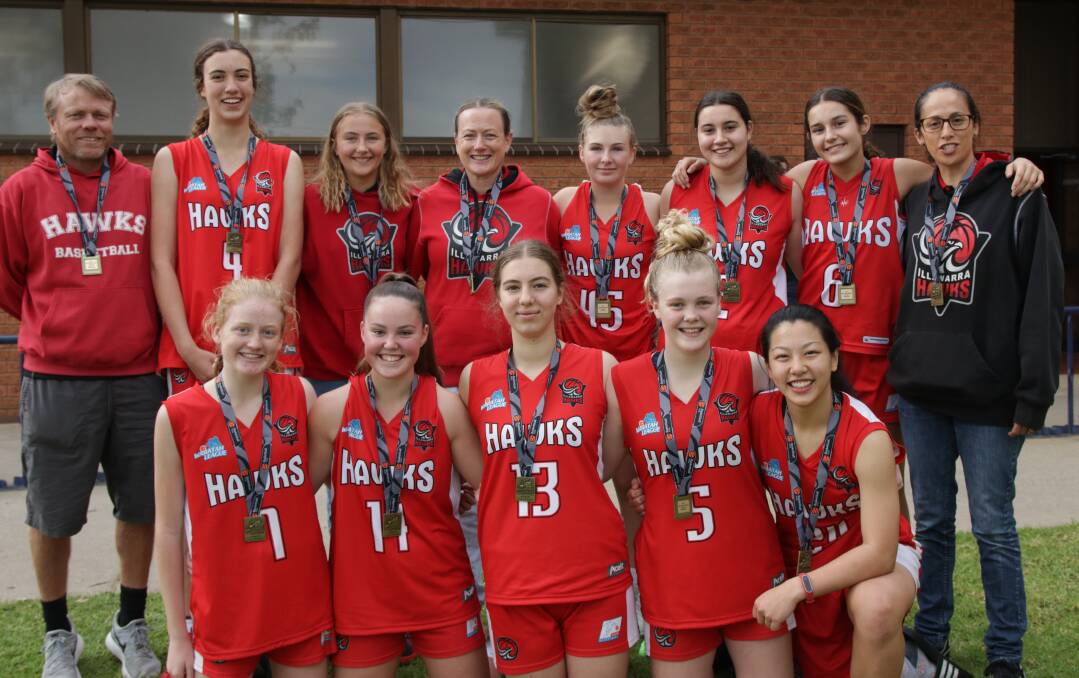 Winners are grinners: The Illawarra under 16 girls basketball team after their victory in Albury. Picture: Hengki Widjaja.