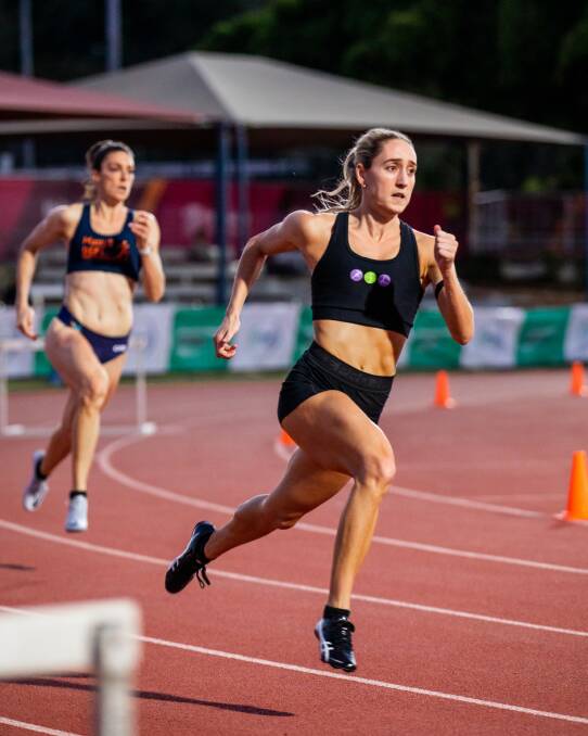 Comeback: Sarah Carli competing in Townsville last month. It was her first race since she suffered a life-threatening injury in February. Picture: Casey Sims/Athletics North Queensland