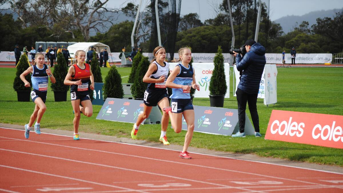 National medalist: Tayissa Buchanan racing at the Australian Little Athletics Championships. Picture: Lisa Bardney. 