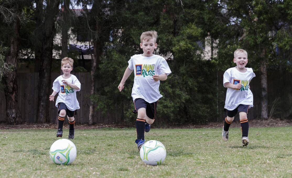 Kicking goals: Lake Heights Junior Football Club will launch a new MiniRoos program next week. 