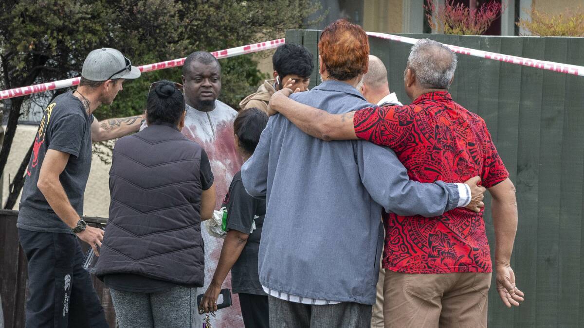 ALIVE: A survivor from the shooting comes through the cordon in Linwood Avenue, Christchurch. Picture: STUFF NZ