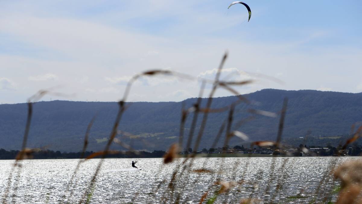 A windsurfer taking advantage of the sea breeze at Lake Illawarra.