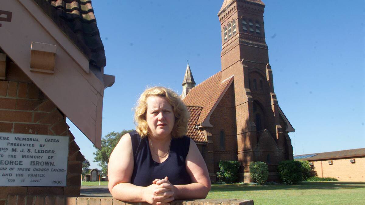 Vicky King pictured in 2002 in Brownsville, during a debate over Wollongong's small suburbs and the significance of their names. 