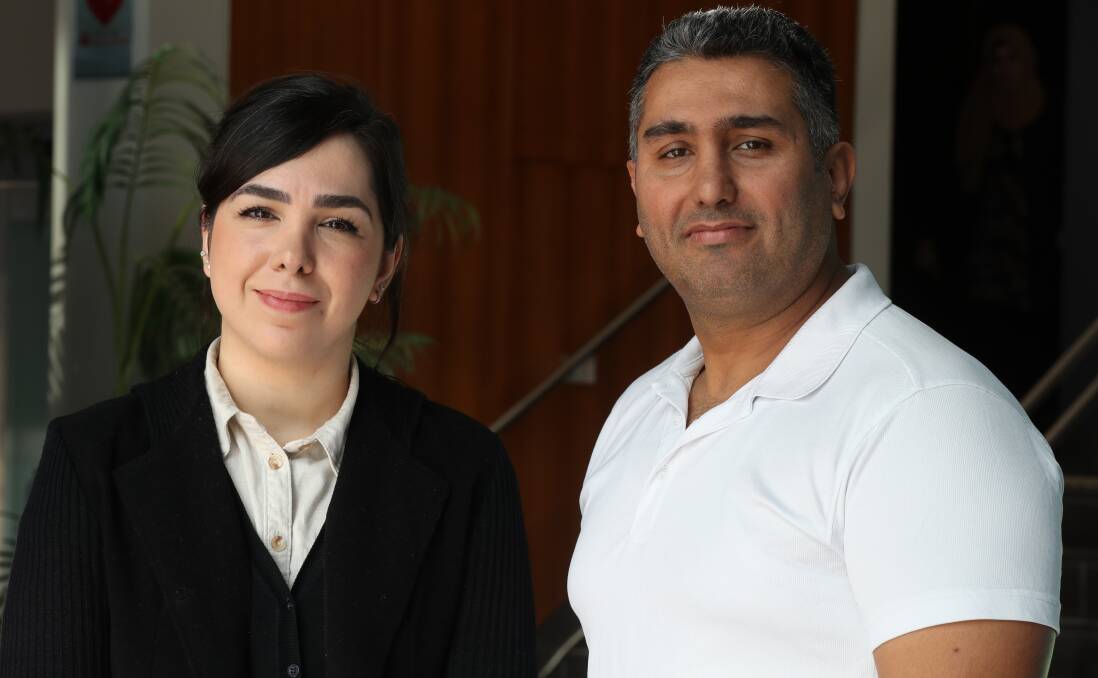 Khatereh Khoshnejadahmadi and Abbas Azizi shared their stories at the Wollongong City Council Refugee Week Community event held at Wollongong Town Hall. Picture by Robert Peet.