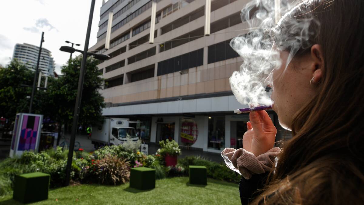 A young woman vaping in Crown Street Mall. File photo