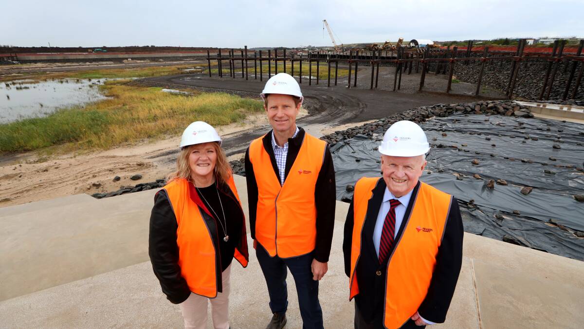 Construction imminent: Mayor Marianne Saliba with Frasers' Glenn Colquhoun and Walcom Australasia's Ian McAndrew at the marina site. Picture: Sylvia Liber.