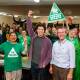 Vote growth: Greens candidates Dylan Green (centre) and Jamie Dixon (right) celebrate the party's gain in vote share. Picture: Anna Warr