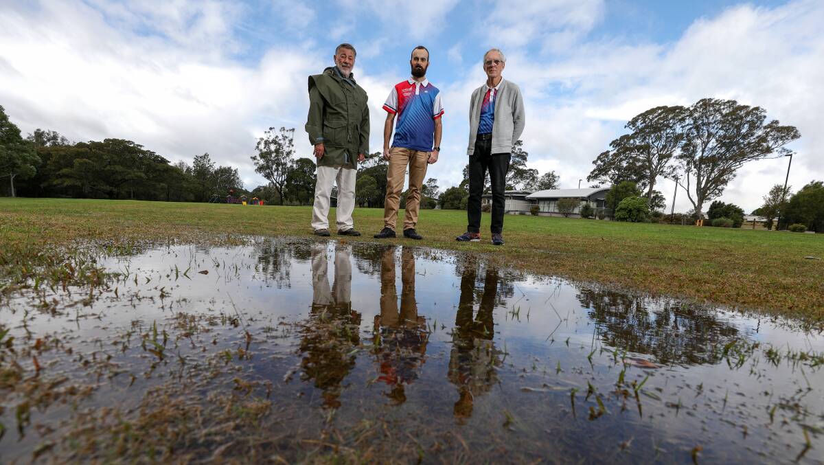 'Too swampy': Kembla Joggers' Dave Barnett, Ben Scollary and David Church at Integral Energy Park, which they say is unsuitable for events. Picture: Adam McLean.