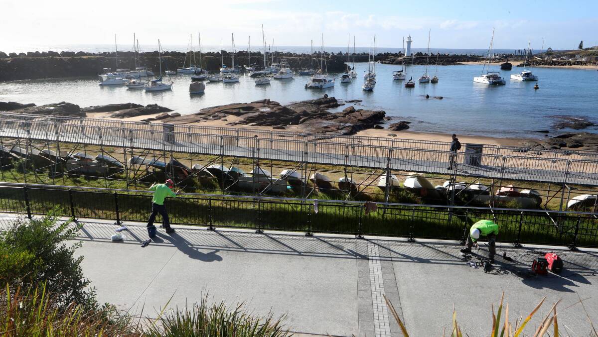 Final touches: Contractors have spent this week completing minor works also the path, which links Belmore Basin and North Wollongong Beach. 
