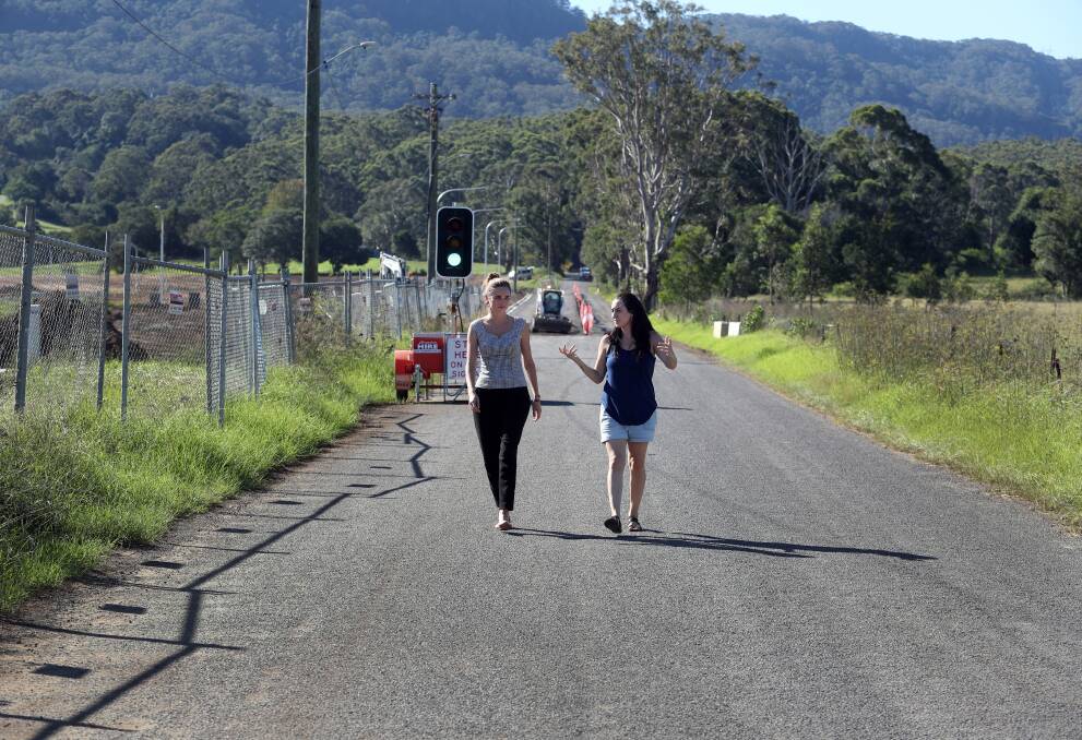 Behind bars: This narrow road separates Ami Beck's (right) future home from the proposed prison land; she has joined Britt Bryant to fight the plan. Picture: Robert Peet.