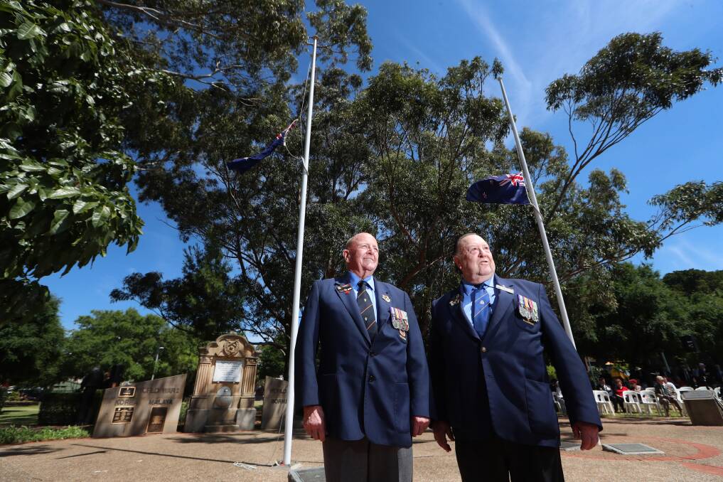 Standing tall: Allan Butler and Doug Johnston, of the City of Wollongong sub-branch, took part in Remembrance Day at Wollongong War Memorial on Monday. 
