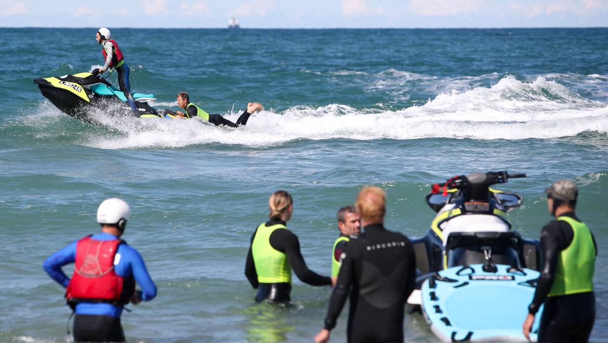Surf's up: Wollongong council's lifeguard recruits train at North Wollongong beach as the swimming season kicks off. Picture: Adam McLean.