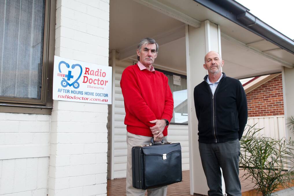 'Never seen a more challenging time': Radio Doctor Illawarra's Dr Darryl Bryant (chairman and doctor) and Frank Wallner (general manager) say the GP shortage has left the service struggling to answer calls. Picture: Anna Warr. 