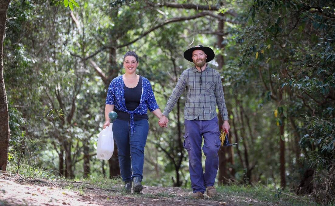 Clementina Velasco and Emmett Weatherford at their bush care site in West Wollongong, where they're holding a singles working bee next month. Picture by Adam McLean.