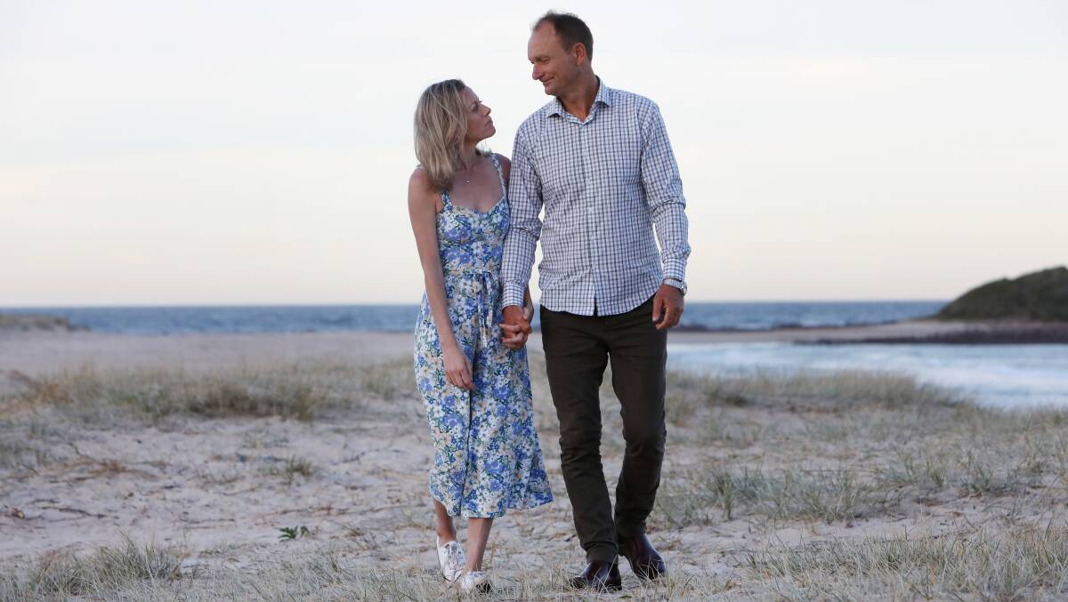 Vikki Muller and Chris Homer, walking along the beach together near their Lake Illawarra home, have been left feeling that they have no trust in the system after their ordeal. Picture by Sylvia Liber