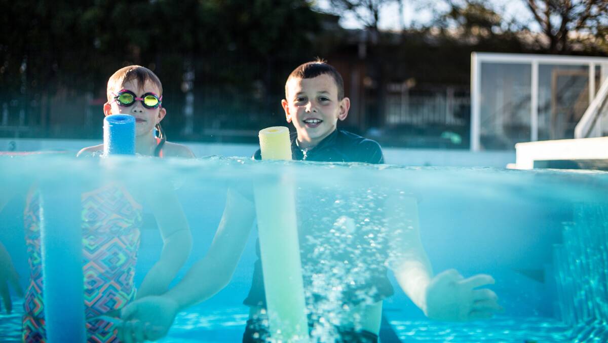 Ban reversal: Skye and Tyler Williams at Corrimal pool, where novelty races will now be allowed a school carnivals. Picture: Georgia Matts.