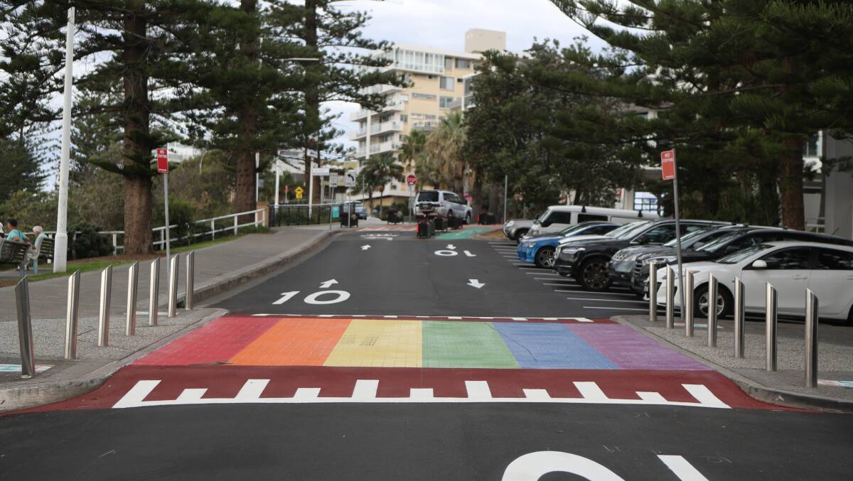 Loud and proud: Wollongong's rainbow crossing has reappeared outside the Novotel Northbeach, after the original version was worn away. Picture: Robert Peet.
