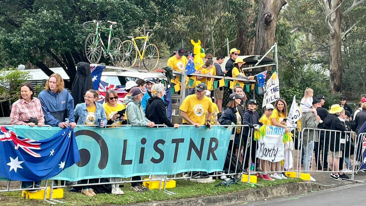 Aussie cycling fans served up sausages from their "Grill On The Hill" set up to embrace the festive atmosphere on Ramah Avenue. Pictures by Kate McIlwain