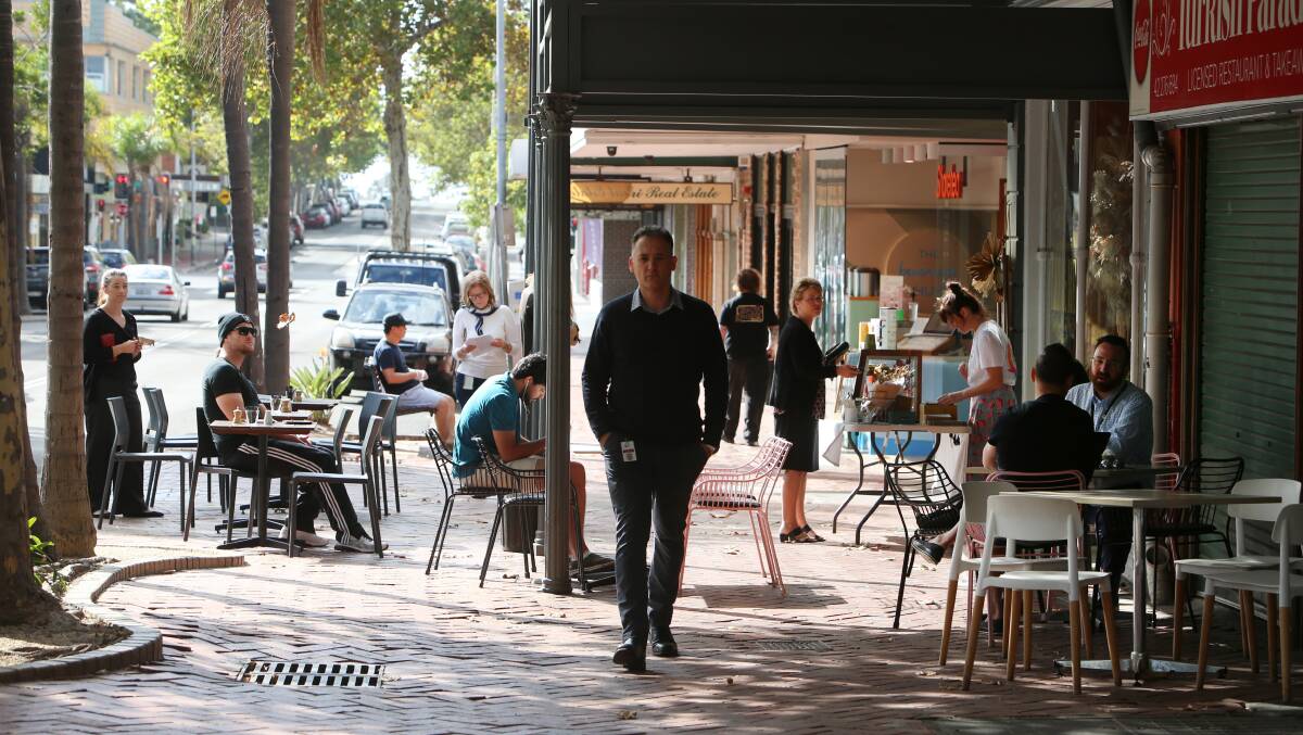 Breakfast club: At Lee and Me and cafes around Wollongong, customers took their last chance for an eat in meal. Picture: Sylvia Liber.