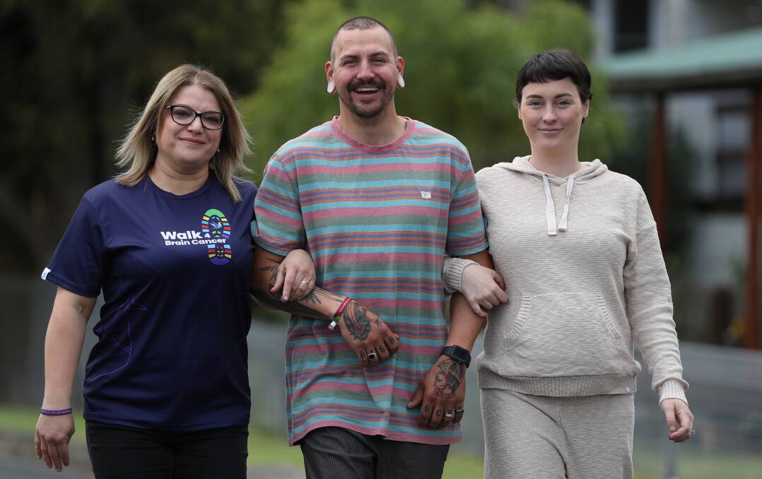 Jacob and Maddi Purcell walking with Kate, Mitrovski, who runs the Wollongong Walk 4 Brain Cancer to help raise money for the cause. Picture by Robert Peet
