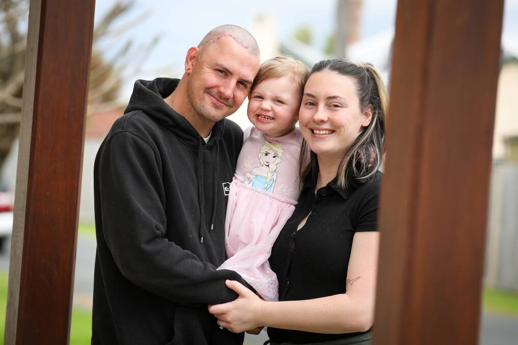 Brownsville's Jacob Purcell, with daughter Lula and fiance Maddi, was diagnosed with aggressive, incurable brain cancer last month. Picture by Adam McLean.