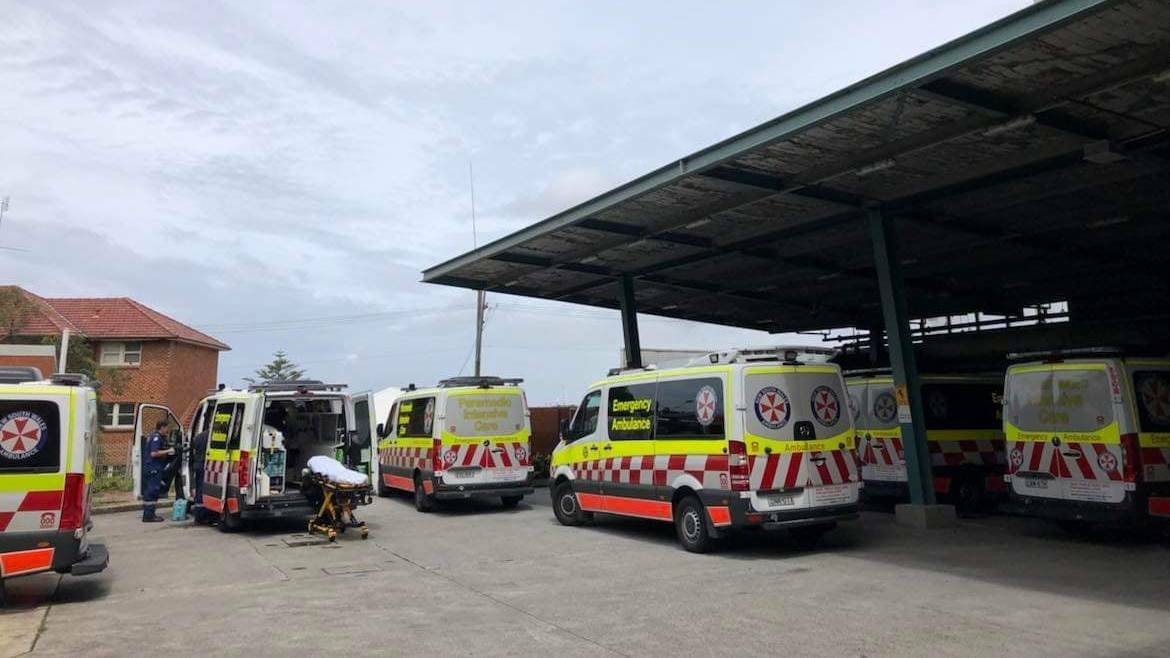 Stuck for hours: The Illawarra Shoalhaven sub-branch of the Health Services Union ambulance division shared this photo of ambulances in bed block at Wollongong Hospital on Monday. Picture: Supplied