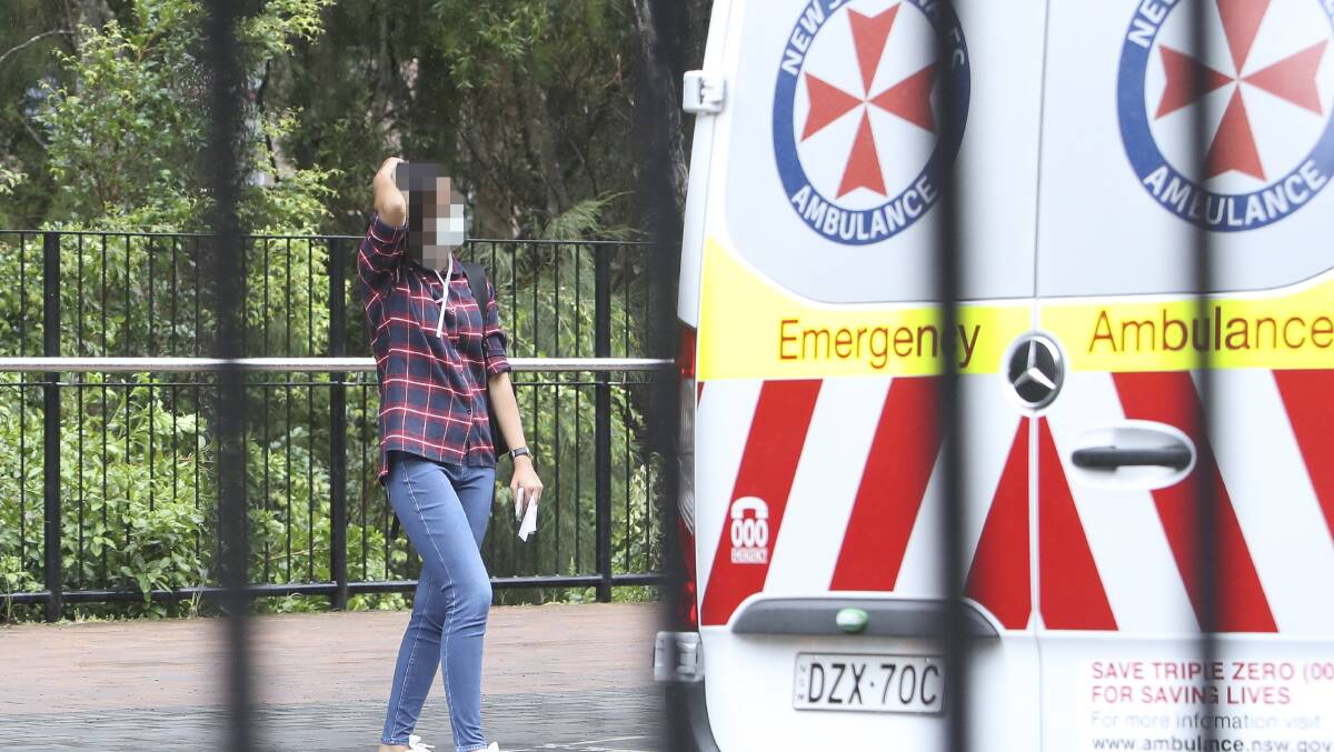 The woman was assessed by paramedics before being taken to hospital. Picture: Adam McLean