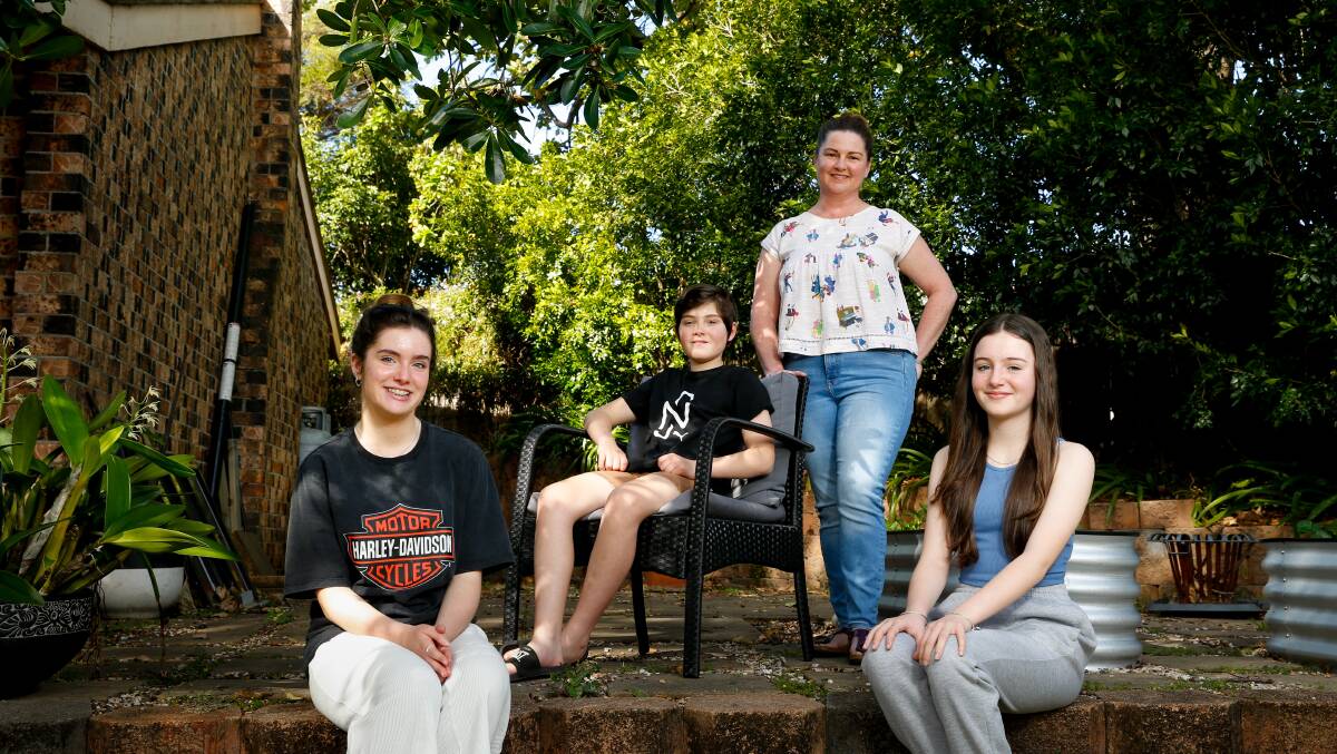 Healthy Cities Illawarra boss Kelly Andrews and her three kids Riley, Asha and Lewis. Picture: Anna Warr