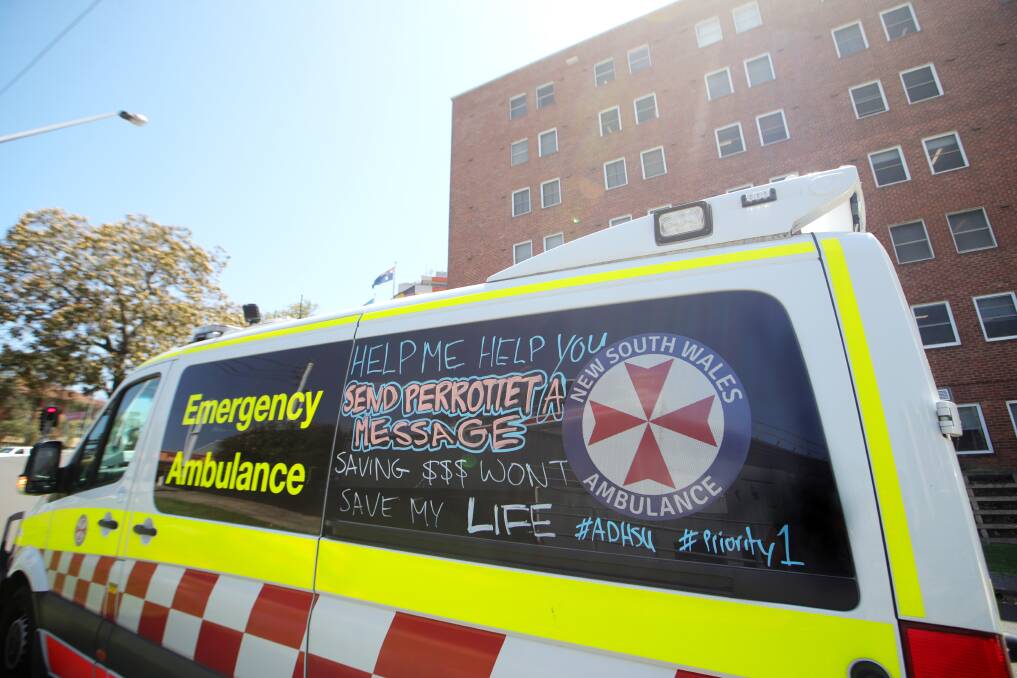 Wollongong paramedics who are part of the Health Services Union have been running a chalking campaign on their ambulances to highlight the issues in the health system. Picture by Sylvia Liber.