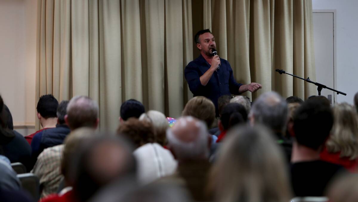 Former parole officer and Public Services Association assistant general secretary Troy Wright armed the jail opponents with questions they should ask about the proposed Kembla Grange jail. Picture: Sylvia Liber.