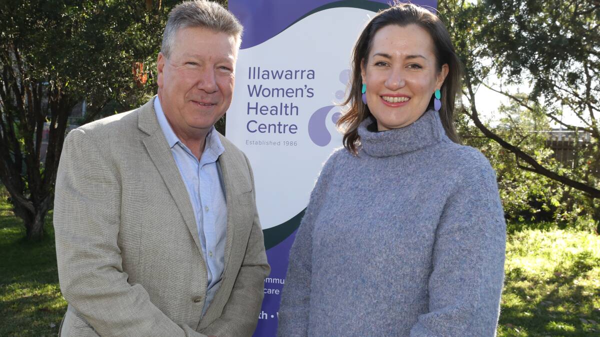 South32's Peter Baker with director of the Illawarra Women's Trauma Recovery Centre Lula Dembele. Picture by Robert Peet