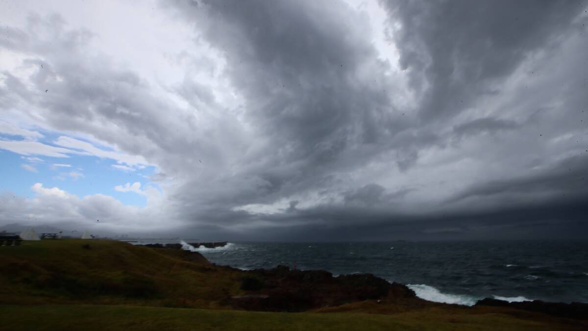 The storm passes over Port Kembla. Picture: Sylvia Liber.
