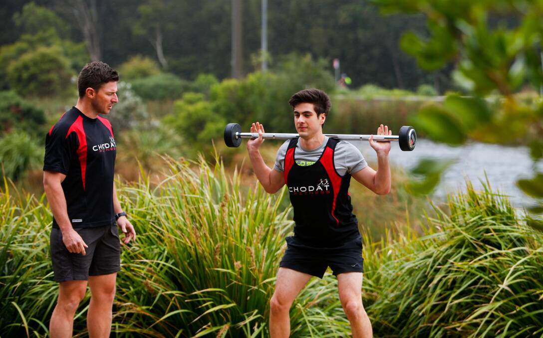 Hefty fees: Cem Ozer with personal trainer Lukas Chodat, who says Wollongong's fitness fees are to high. Picture: Adam McLean.