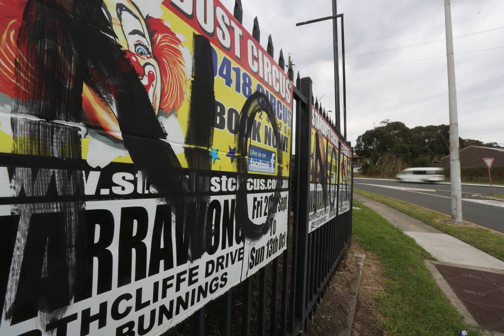 Defaced: Signs on Shellharbour Road, Port Kembla are among those which have been vandalised. Picture: Robert Peet.