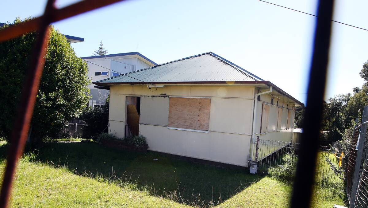 Humble addresses: This boarded-up Fairy Meadow property was listed as the address of a 32-year-old women named as a one-time "straw director".
