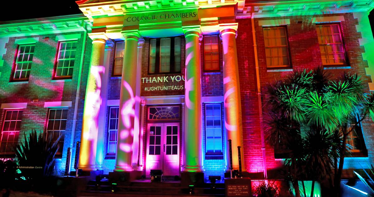 Light in the dark: Kiama's old council building was lit up in secret last week, as part of a national initiative to thank health workers. Picture: R & R Production Services.