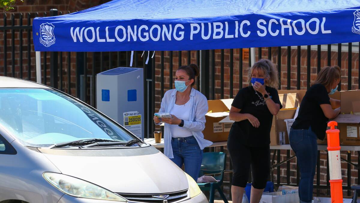 Schools handing out RAT to parents at the beginning of Term 1. Picture: Wesley Lonergan.