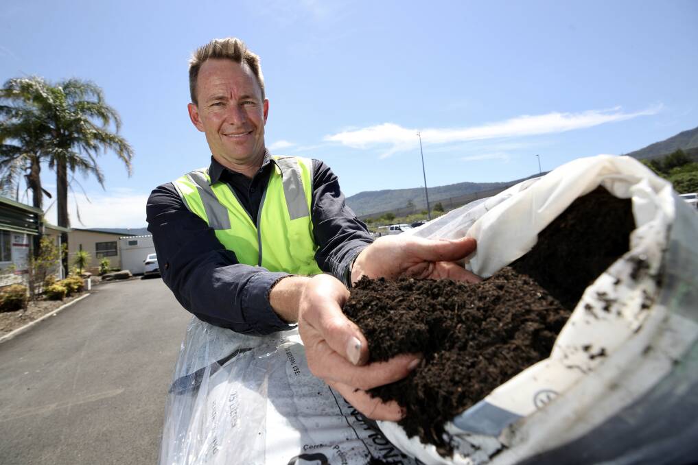 End product: Soilco General Manager Charlie Emery with the compost that his compnay makes from the FOGO waste. 