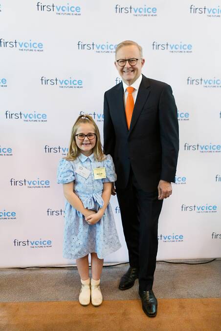 Seven-year-old Harper Rollinson, from Bulli, with Prime Minister Anthony Albanese in Canberra, where she spoke at an event for cochlear recipients on Thursday. Picture supplied.