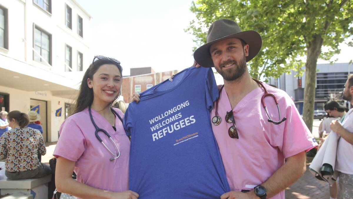 Taking action: Medical students Hannah Clements and Michael Nielsen joined the rally in Wollongong on Saturday. Picture: Anna Warr. 