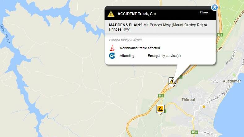 Mount Ousley Road blocked after truck and car crash