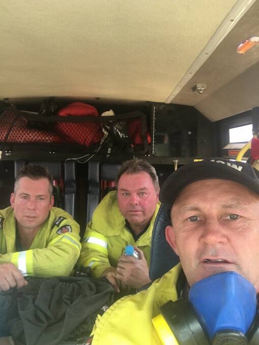 Firsthand experience: Darin Sullivan (front) will call for action on climate change as a speaker at Saturday's protest and share his account of how he has saved homes and lives during the bushfire emergency. 