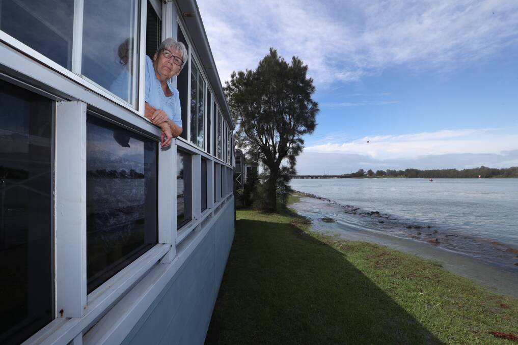 Rising tide: Maxine Tyrell watched as water came over the lake wall and within metres of her house.